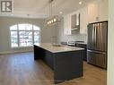 Kitchen + DR - 2305 Callingham Drive, London, ON  - Indoor Photo Showing Kitchen With Stainless Steel Kitchen With Double Sink With Upgraded Kitchen 