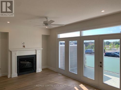 Main-LR & Balcony - 2305 Callingham Drive, London, ON - Indoor Photo Showing Other Room With Fireplace