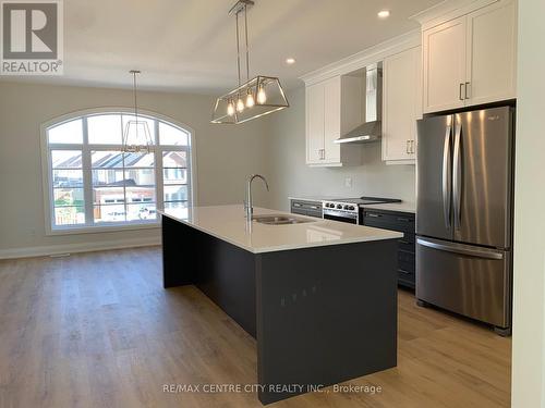 2305 Callingham Drive, London, ON - Indoor Photo Showing Kitchen With Stainless Steel Kitchen With Double Sink With Upgraded Kitchen