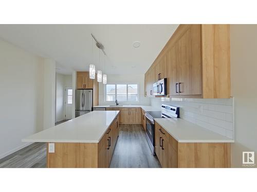 #Main 5715 Hawthorn Cm Sw, Edmonton, AB - Indoor Photo Showing Kitchen