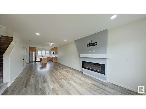 #Main 5715 Hawthorn Cm Sw, Edmonton, AB - Indoor With Fireplace