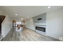 #Main 5715 Hawthorn Cm Sw, Edmonton, AB  - Indoor With Fireplace 