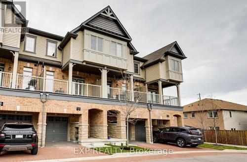 14 - 285 Finch Avenue, Pickering, ON - Outdoor With Balcony With Facade