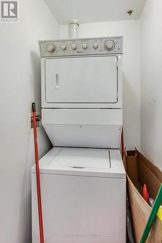 1313 - 55 Speers Road, Oakville, ON - Indoor Photo Showing Laundry Room