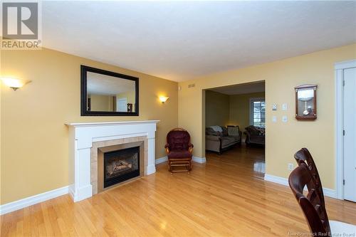 23 Camelot, Moncton, NB - Indoor Photo Showing Living Room With Fireplace