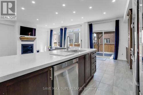 159 Franklin Trail, Barrie, ON - Indoor Photo Showing Kitchen With Fireplace With Double Sink