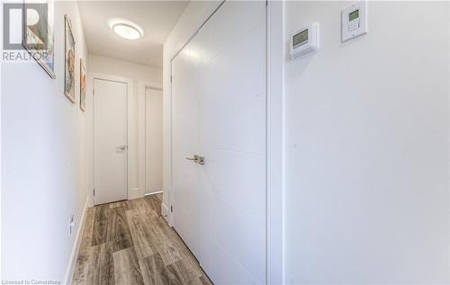 Hallway featuring light wood-type flooring - 54 Bridge Street West Street W Unit# 6, Kitchener, ON - Indoor Photo Showing Other Room