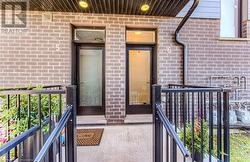 View of exterior entry with a balcony - 