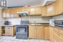 105 - 180 Mississauga Valley Boulevard, Mississauga, ON  - Indoor Photo Showing Kitchen With Double Sink 