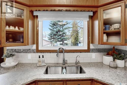 18 Bligh Bay, Regina, SK - Indoor Photo Showing Kitchen With Double Sink