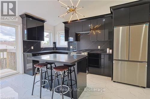 8414 Atack Court N, Niagara Falls (213 - Ascot), ON - Indoor Photo Showing Kitchen With Double Sink