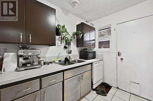 2090/2092 Westsyde Road, Kamloops, BC - Indoor Photo Showing Kitchen With Double Sink