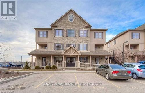 8J - 1460 Highland Road W, Kitchener, ON - Outdoor With Balcony With Facade