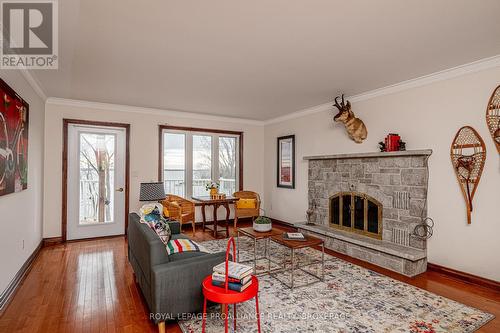 4734 Lakeside Lane, Loyalist (Lennox And Addington - South), ON - Indoor Photo Showing Living Room With Fireplace