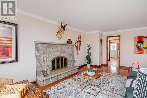 4734 Lakeside Lane, Loyalist (Lennox And Addington - South), ON - Indoor Photo Showing Living Room With Fireplace