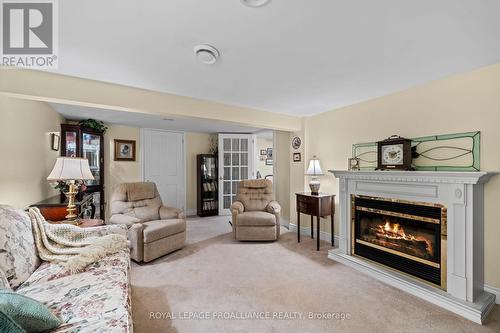 2 Sandpiper Way, Brighton, ON - Indoor Photo Showing Living Room With Fireplace