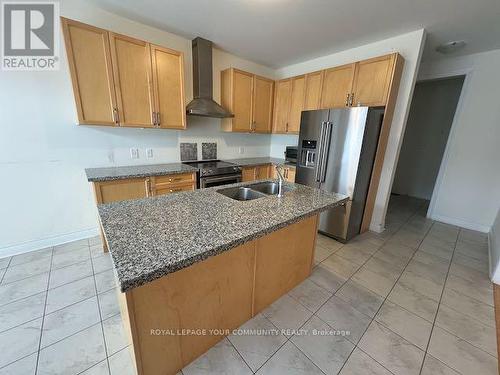 13 Henry Wilson Drive, Caledon, ON - Indoor Photo Showing Kitchen With Double Sink