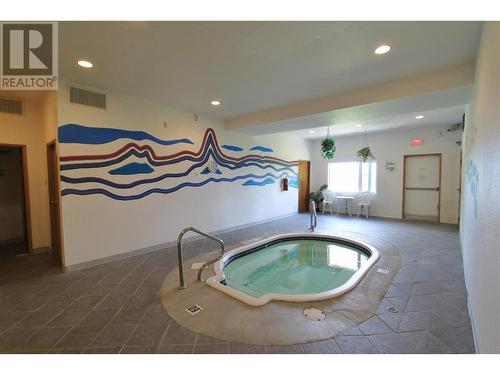 880 Northstar Drive Unit# 829, Kimberley, BC - Indoor Photo Showing Other Room With In Ground Pool