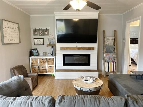 935 Armit Avenue North, Fort Frances, ON - Indoor Photo Showing Living Room With Fireplace