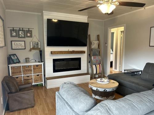 935 Armit Avenue North, Fort Frances, ON - Indoor Photo Showing Living Room With Fireplace