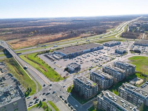 Photo aÃ©rienne - 503-9815 Boul. Leduc, Brossard, QC - Outdoor With View