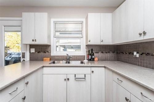 930-932 Lawson Avenue, Kelowna, BC - Indoor Photo Showing Kitchen With Double Sink