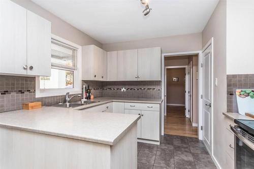 930-932 Lawson Avenue, Kelowna, BC - Indoor Photo Showing Kitchen With Double Sink