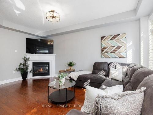 1813 Lamstone St, Innisfil, ON - Indoor Photo Showing Living Room With Fireplace