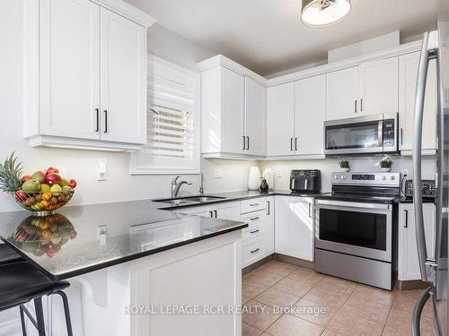 1813 Lamstone St, Innisfil, ON - Indoor Photo Showing Kitchen With Double Sink