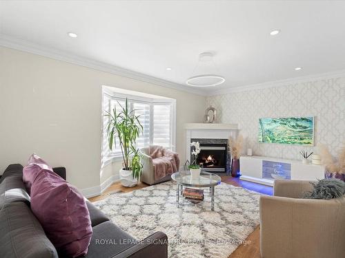 74 Littleleaf Cres, Markham, ON - Indoor Photo Showing Living Room With Fireplace