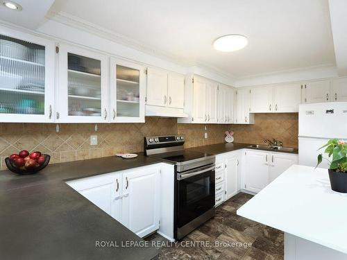 103-3040 Constitution Blvd, Mississauga, ON - Indoor Photo Showing Kitchen With Double Sink