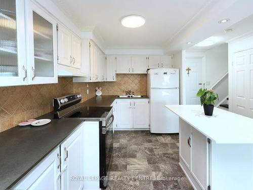 103-3040 Constitution Blvd, Mississauga, ON - Indoor Photo Showing Kitchen With Double Sink