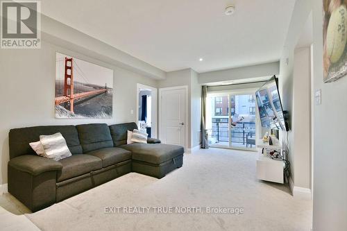 303 - 300 Essa Road, Barrie, ON - Indoor Photo Showing Living Room