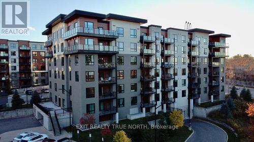 303 - 300 Essa Road, Barrie, ON - Outdoor With Balcony With Facade