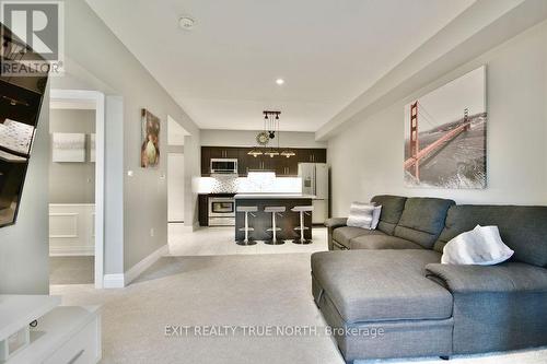 303 - 300 Essa Road, Barrie, ON - Indoor Photo Showing Living Room