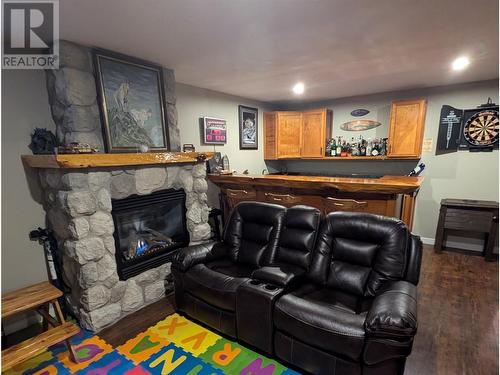 239 Moore Subdivision, Dawson Creek, BC - Indoor Photo Showing Living Room With Fireplace