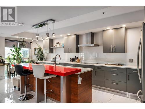 Kitchen Island - 1156 Sunset Drive Unit# 113, Kelowna, BC - Indoor Photo Showing Kitchen With Upgraded Kitchen