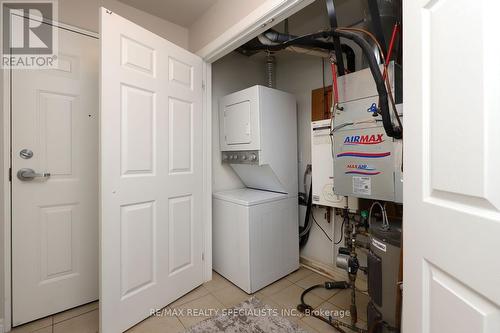 4-02 - 2420 Baronwood Drive, Oakville, ON - Indoor Photo Showing Laundry Room