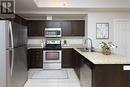 4-02 - 2420 Baronwood Drive, Oakville, ON  - Indoor Photo Showing Kitchen With Double Sink 