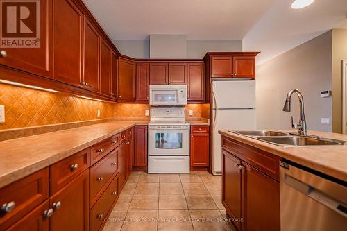 76 Aaron Trail, Welland (766 - Hwy 406/Welland), ON - Indoor Photo Showing Kitchen With Double Sink