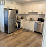 535 - 4263 Fourth Avenue, Niagara Falls (210 - Downtown), ON  - Indoor Photo Showing Kitchen With Stainless Steel Kitchen With Double Sink 