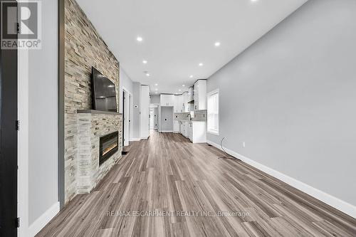 16 Webling Street, Brantford, ON - Indoor Photo Showing Other Room With Fireplace