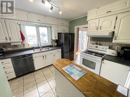 65 Dymond Crescent, Temiskaming Shores (New Liskeard), ON - Indoor Photo Showing Kitchen With Double Sink