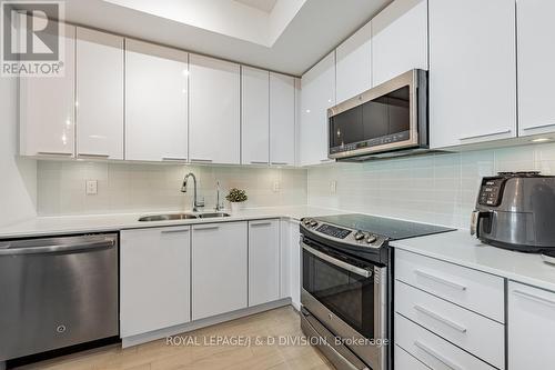 910 - 10 Park Lawn Road, Toronto, ON - Indoor Photo Showing Kitchen With Double Sink With Upgraded Kitchen