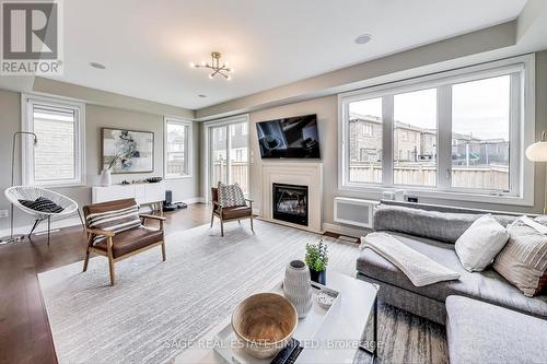 1394 Rose Way, Milton, ON - Indoor Photo Showing Living Room With Fireplace