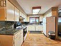 4506 N 97 Highway, Quesnel, BC  - Indoor Photo Showing Kitchen With Double Sink 