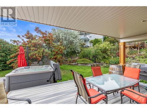 Out door deck is particially covered - 1650 Wilmot Court, Kelowna, BC - Outdoor With Deck Patio Veranda With Exterior