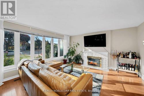 Upper - 4230 Bloor Street W, Toronto, ON - Indoor Photo Showing Living Room With Fireplace