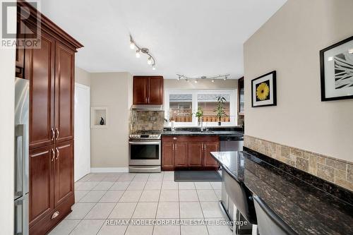 Upper - 4230 Bloor Street W, Toronto, ON - Indoor Photo Showing Kitchen With Double Sink