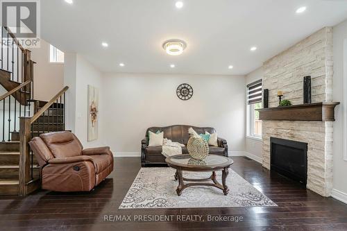 8 Troyer Street, Brampton, ON - Indoor Photo Showing Living Room With Fireplace